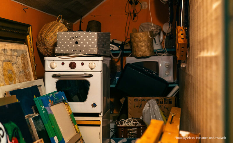 A bunch of personal items such as an oven, microwave and personal belongings that are perfect for a personal storage unit in roseburg, or